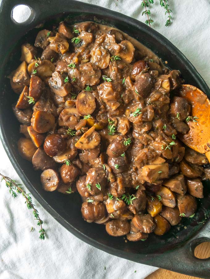 Mushrooms with chestnuts in a madeira wine sauce is a gluten, dairy and sugar free side dish or vegan main dish. One pot, make ahead, easy recipe, perfect for the Christmas holiday or every day! peelwithzeal.com