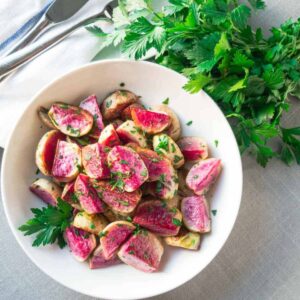 roasted watermelon radishes in white bowl