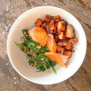 smoked salmon spinach and sweet potatoes in a bowl