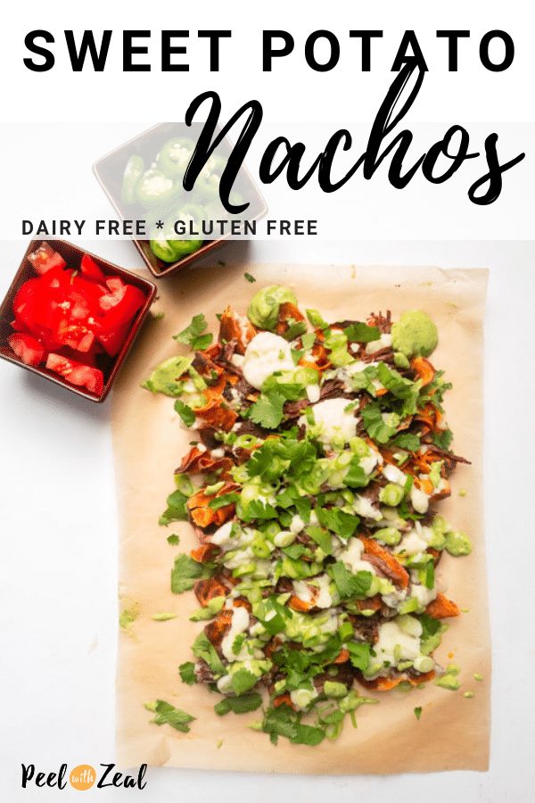 Healthy sweet potato and shredded beef nachos. Topping with spicy horseradish cream sauce, avocado sauce and all the toppings you could ever wants. Nut free, gluten free, dairy free. Paleo, Whole30 compliant with an AIP option. Easy gameday tailgate recipes. #footsball #nachos #peelwithzeal #recipe www.peelwithzeal.com