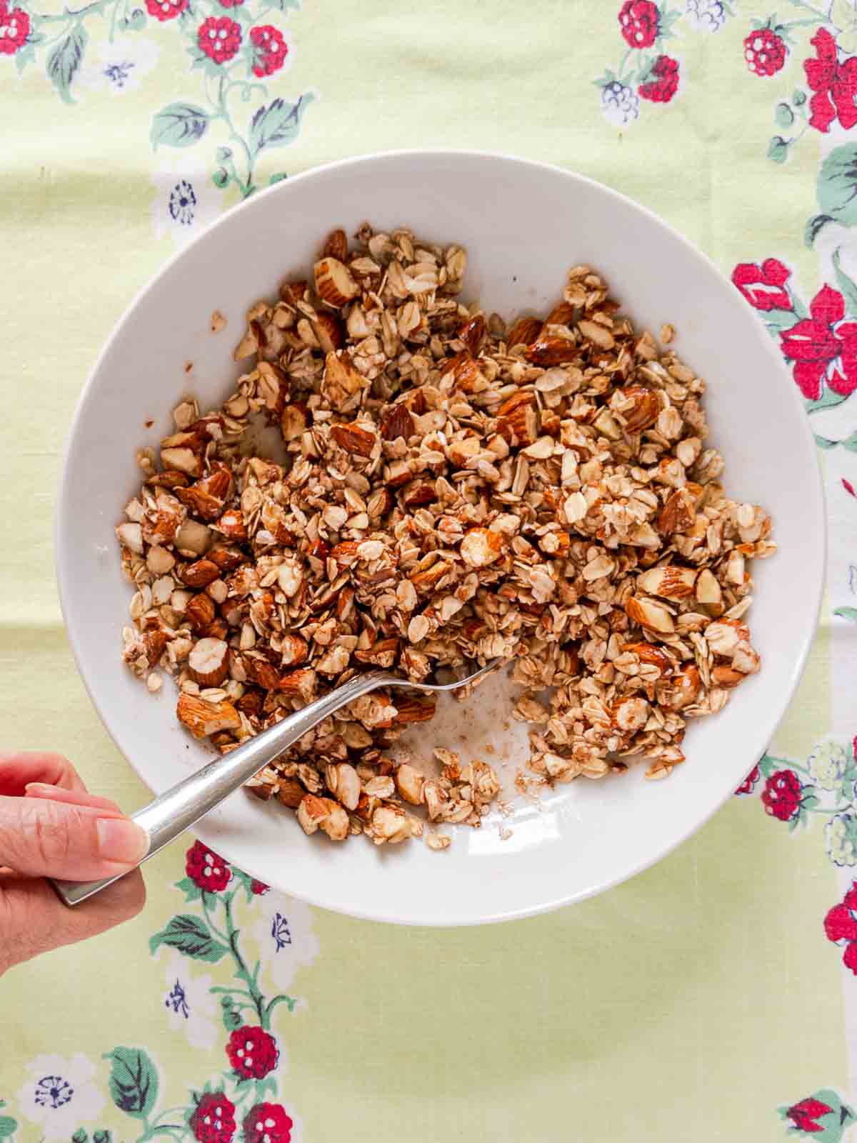 crisp topping being mixed in bowl