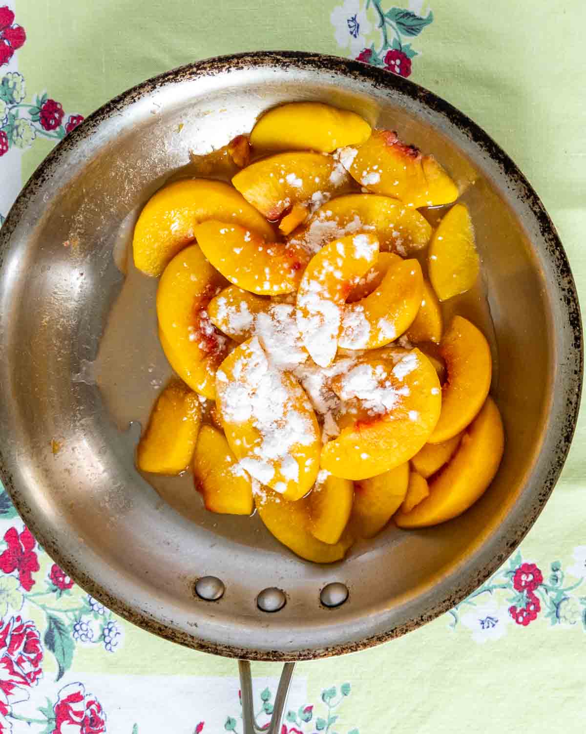 peaches with arrowroot sprinkled over