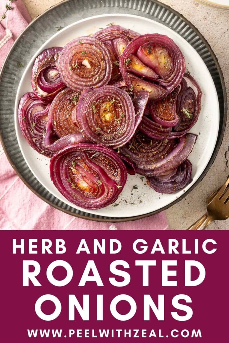 A plate of herb-infused, garlic-roasted red onions sits enticingly on a white dish, each slice exuding savory goodness.