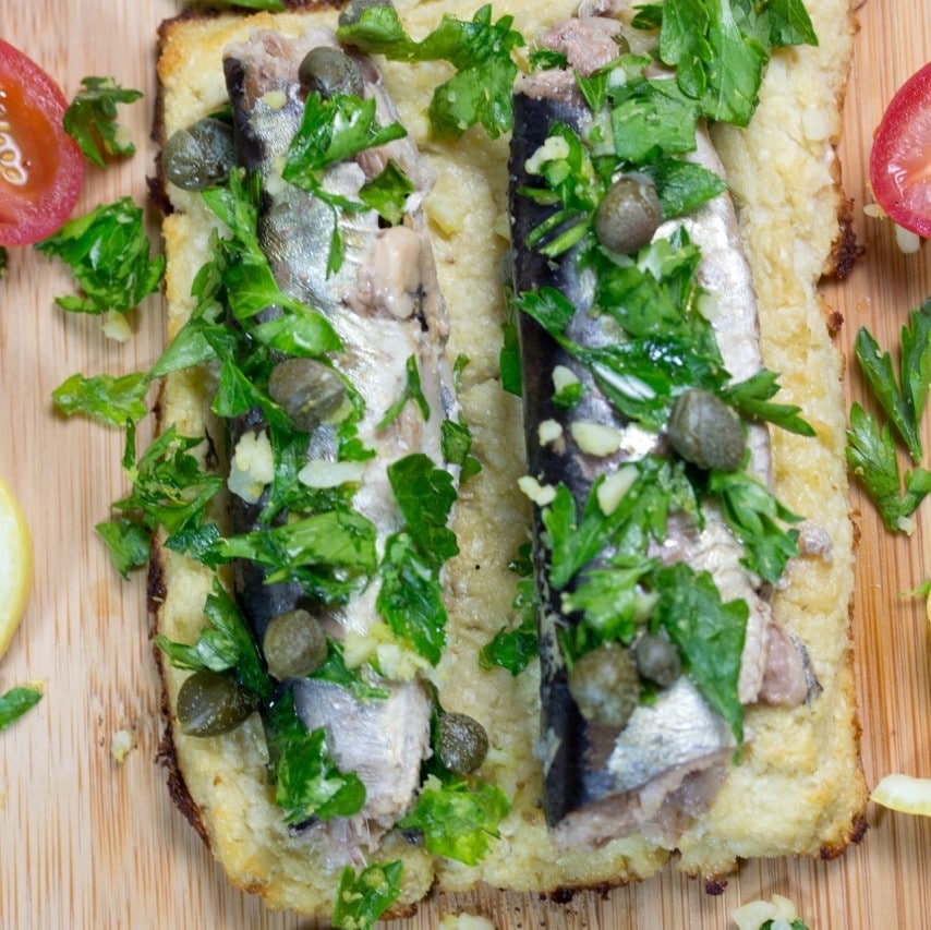 whole sardines on cauliflower toast with herbs