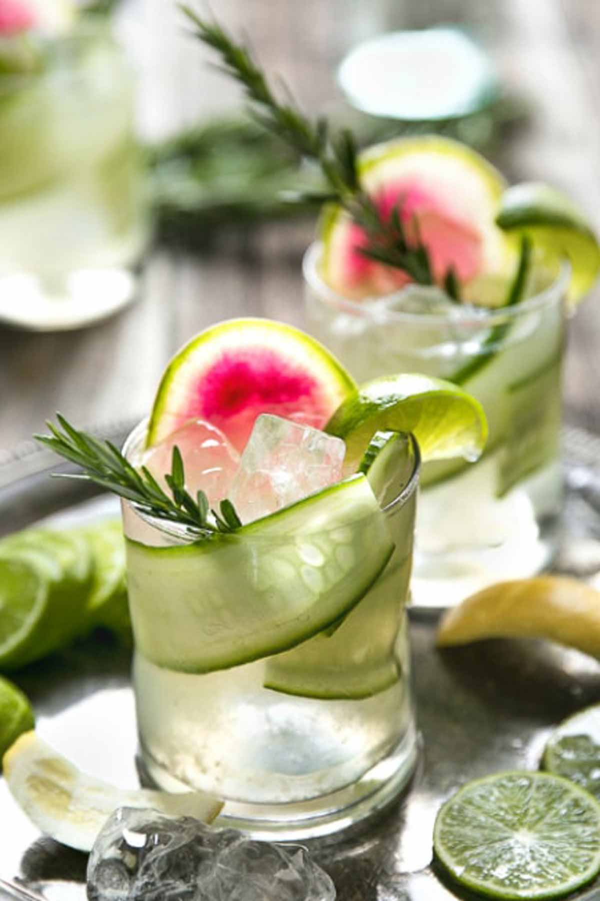 cocktails garnished with watermelon radish and cucumber