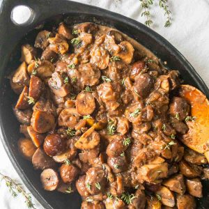 chestnut mushrooms with madeira wine in a serving dish