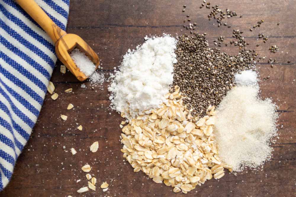 overnight oat recipe ingredients on wood table