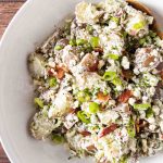 complete blue cheese potato salad recipe in serving bowl