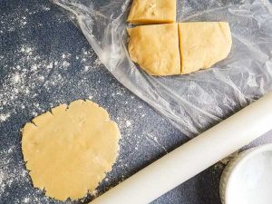rolling out gluten free pie crust