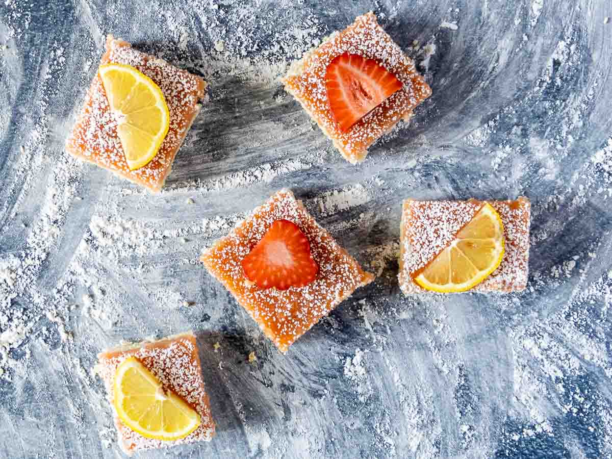 five lemon bars on counter