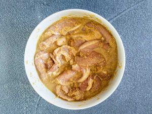 lemongrass pork marinating in a bowl