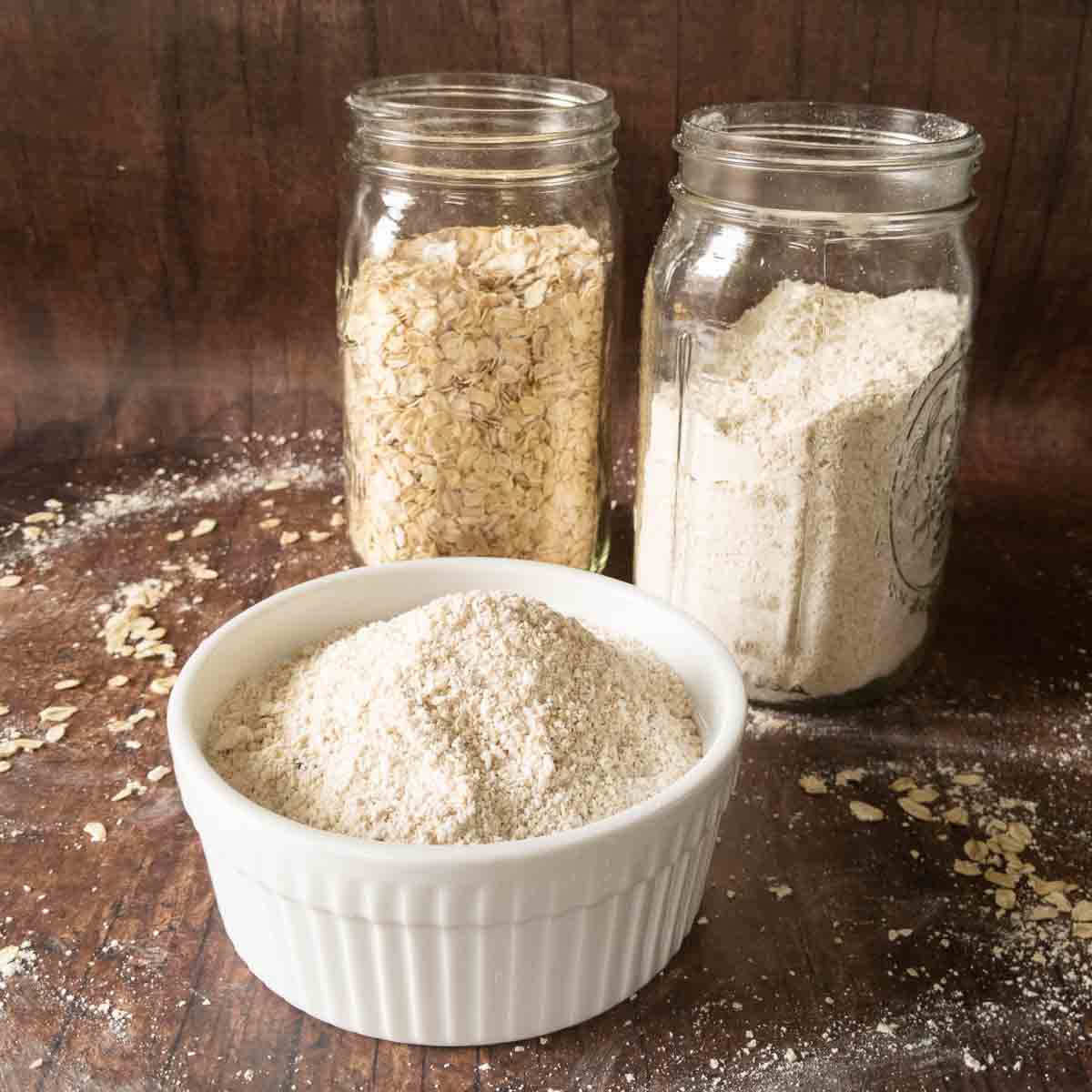 whole oats and oat flour in jars