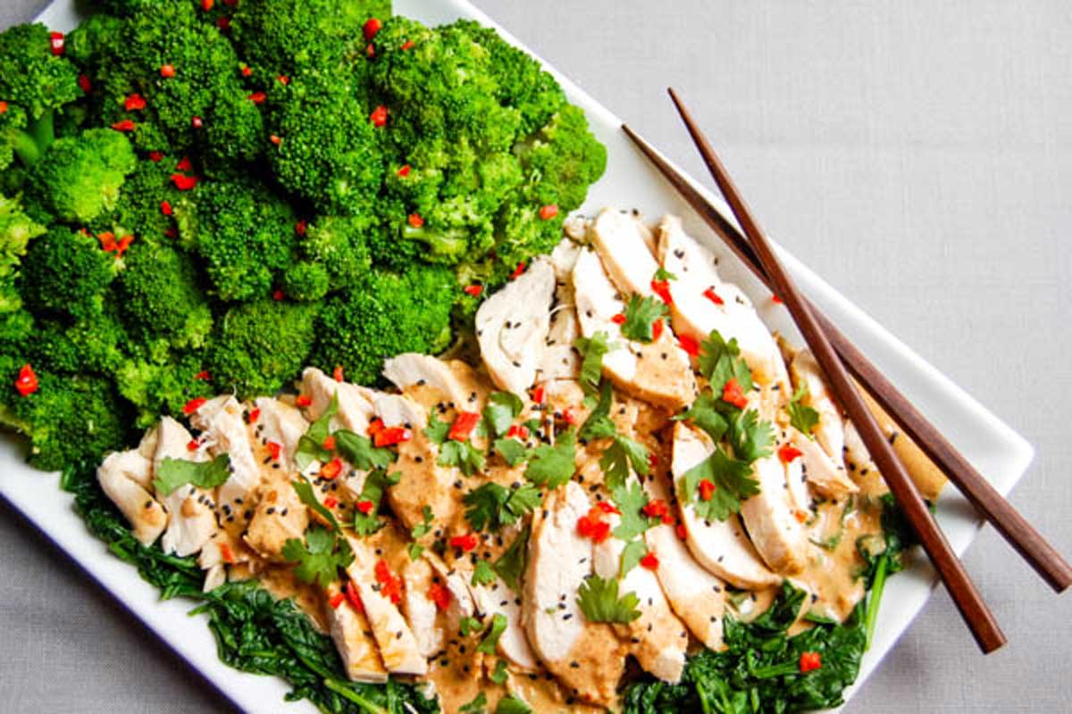 thai peanut sauce on grilled chicken with broccoli