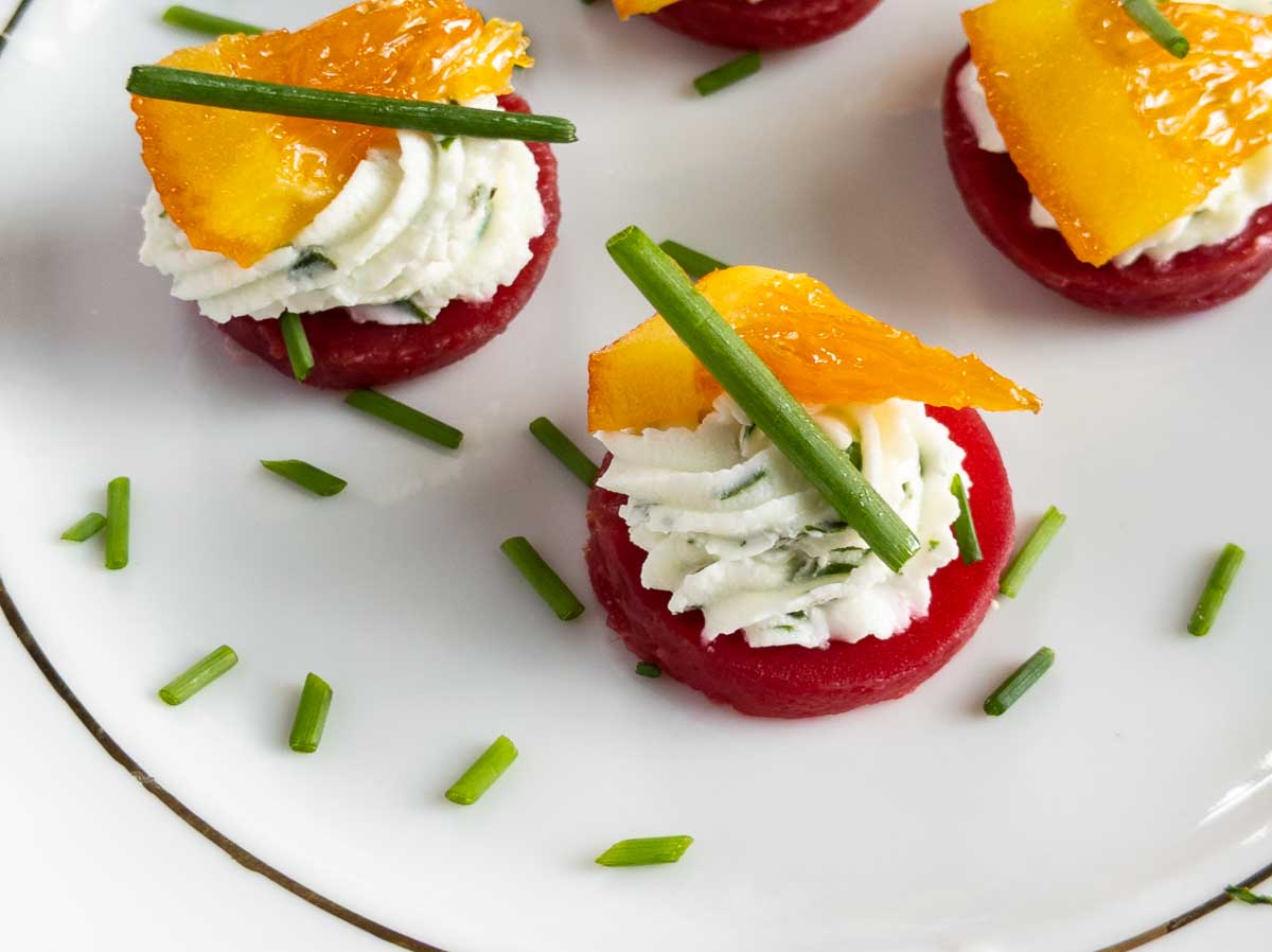 close up shot of beet and goat cheese bite