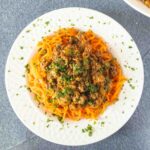 carrot noodles with harissa beef topping