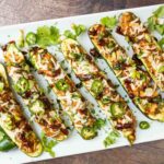 chicken zucchini boats on a platter