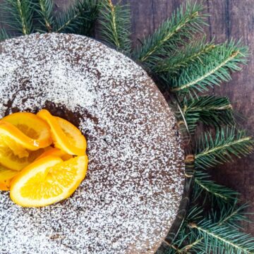 gluten free spice cake decorated with candied oranges