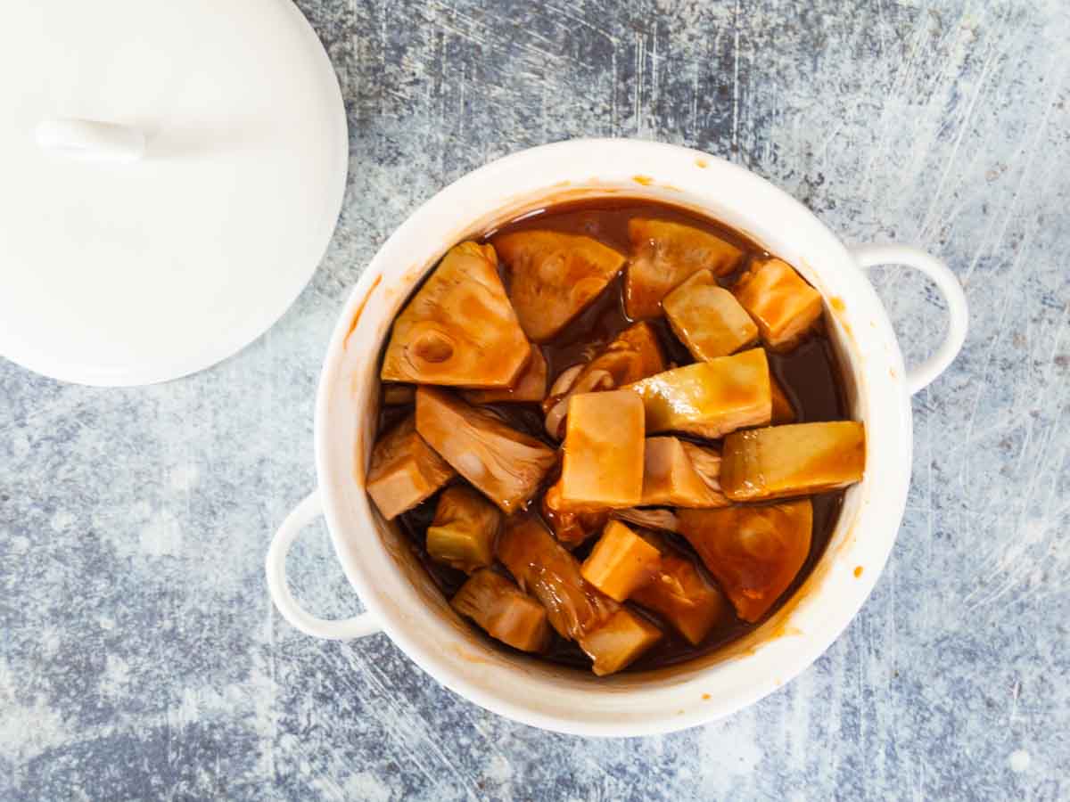jackfruit and BBQ sauce in baking dish
