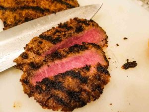 cutting flank steak across the grain