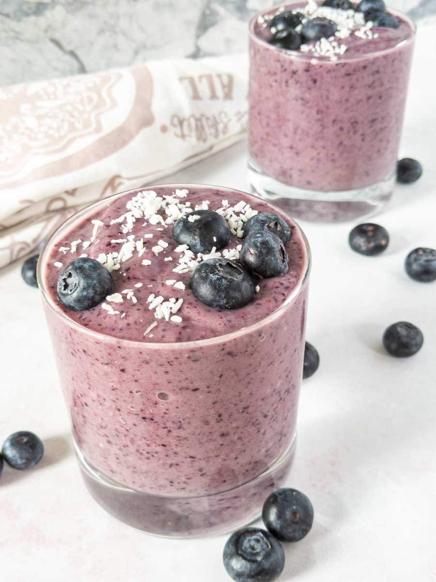 two glasses of blueberry smoothies