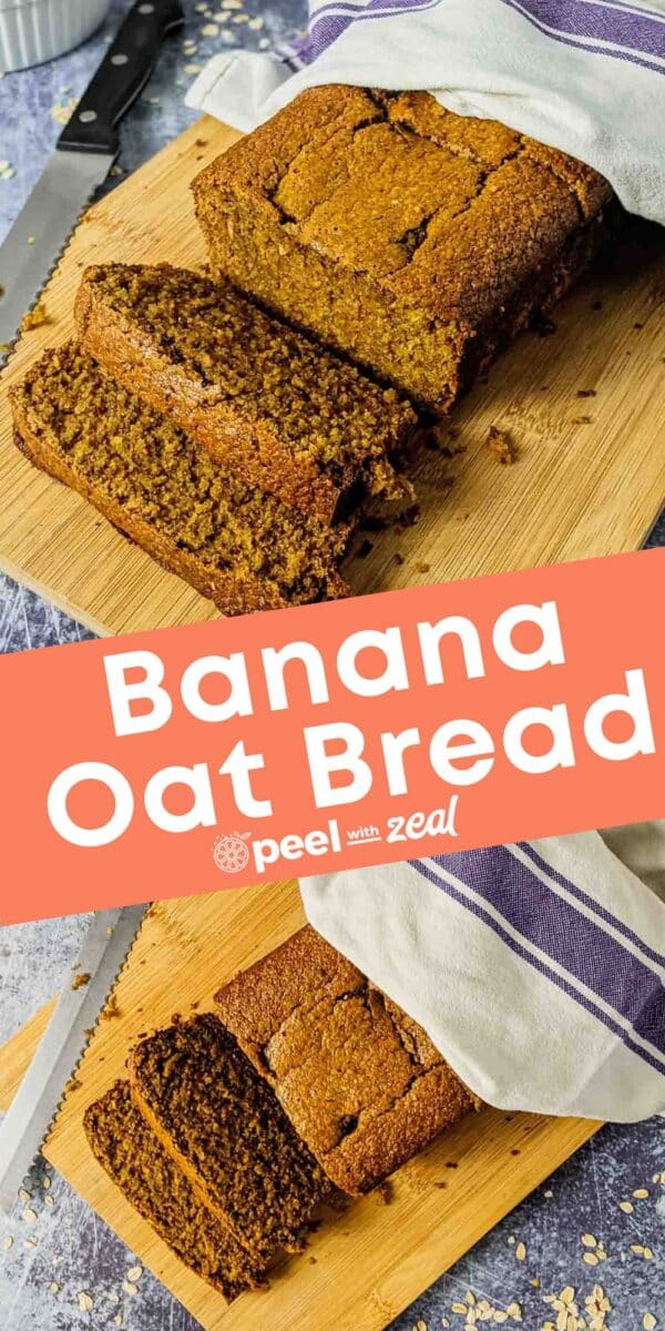 Sliced loaf of oat flour banana bread on a wooden cutting board with a knife and a striped towel nearby.