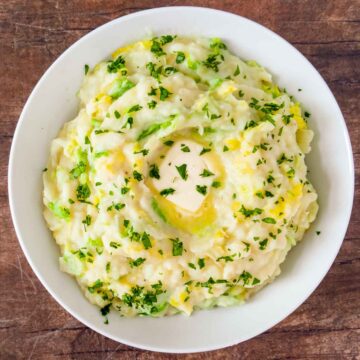 dairy free colcannon potatoes in a white serving bowl