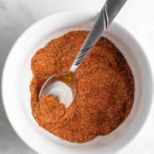 homemade blackening seasoning in a bowl with a spoon