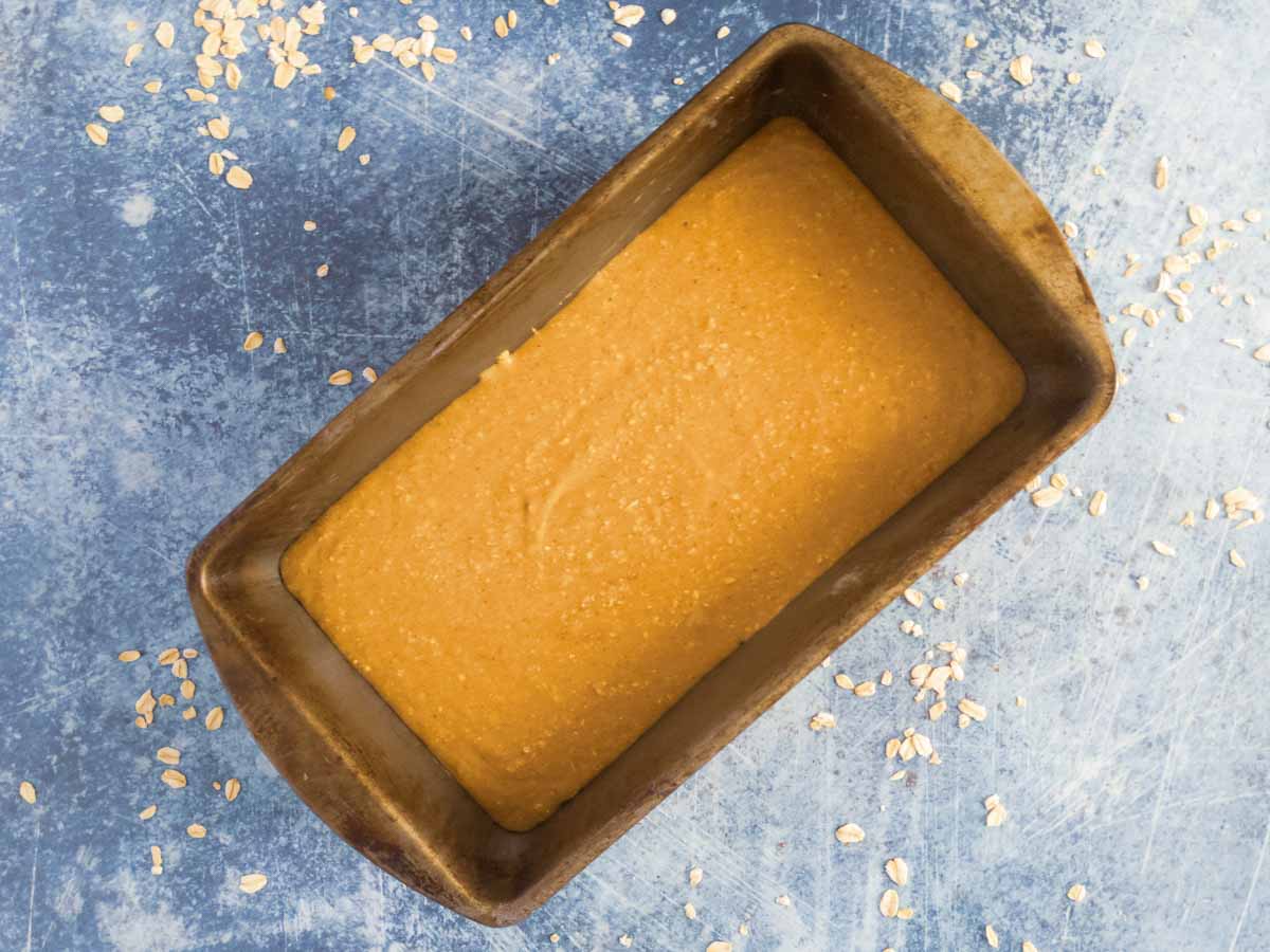 banana bread batter in a tin pan