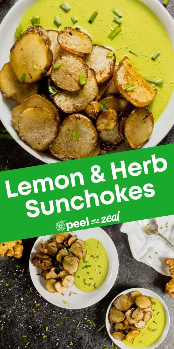 Two white bowls filled with roasted and sauteed sunchokes, topped with green herb sauce and garnished with chives, rest on a dark surface.