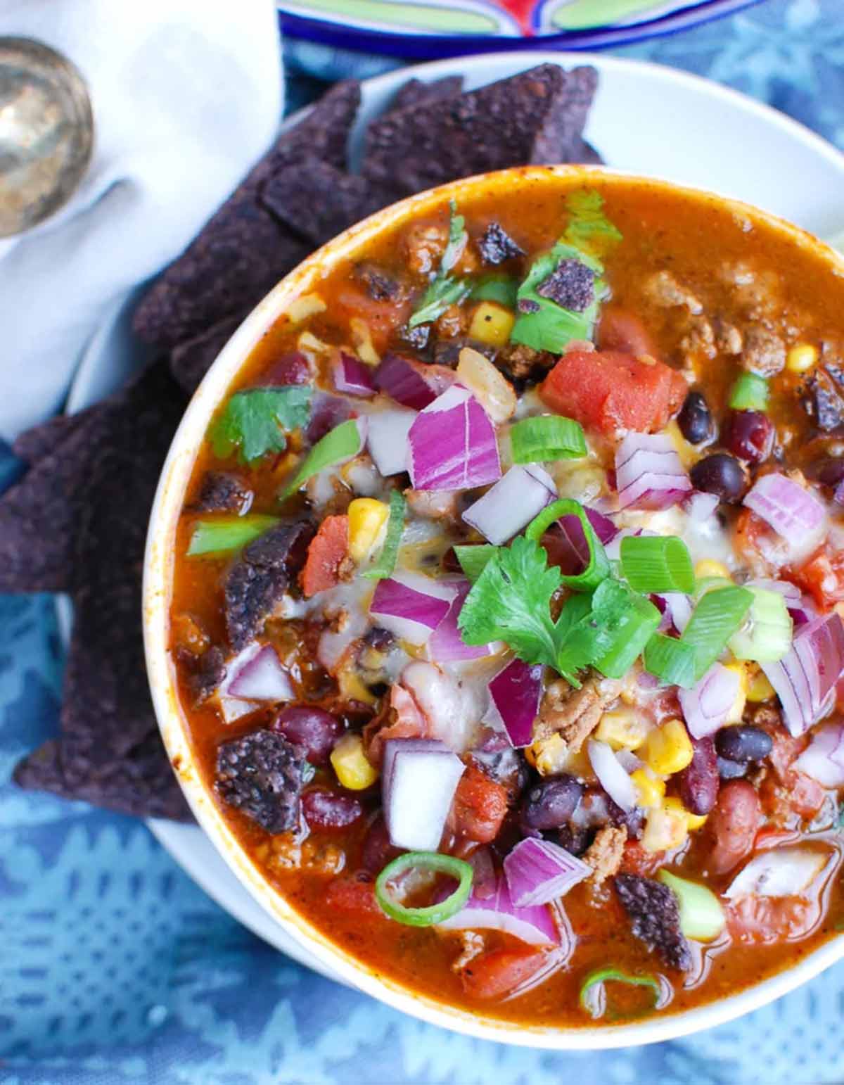 bowl of turkey chili with tortilla chips