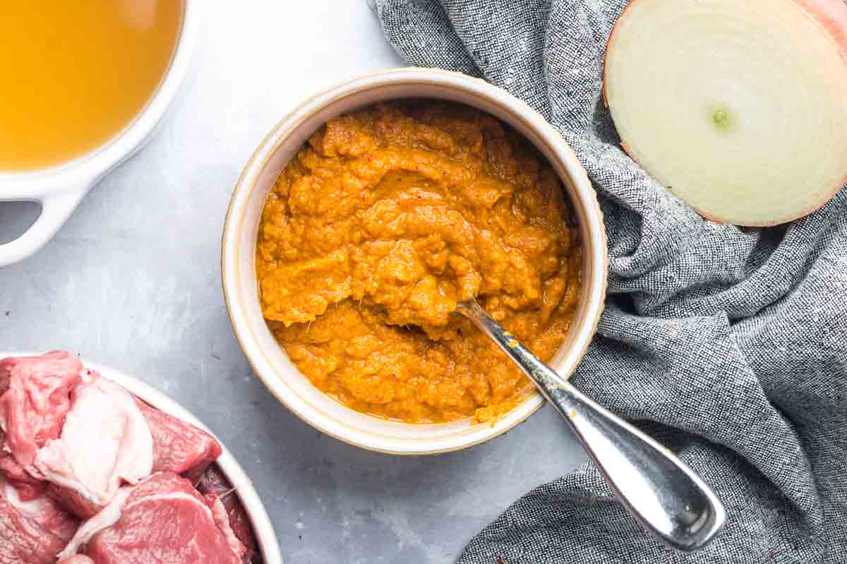 vindaloo paste in a bowl with spoon