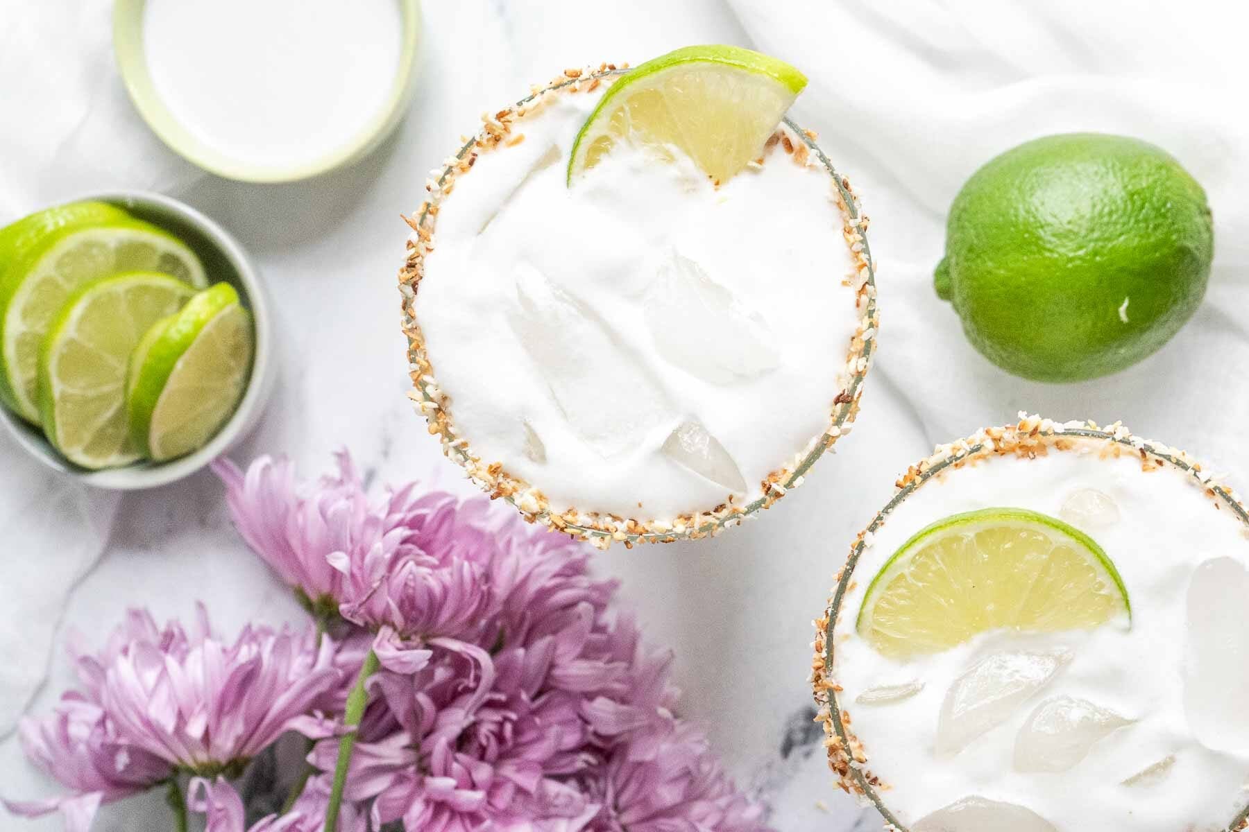 overhead look at two coconut margaritas
