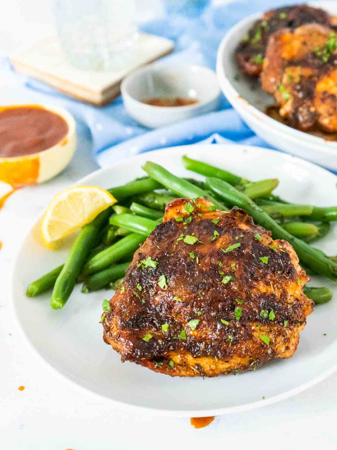 Easy Grilled BBQ Chicken Thighs with Dry Rub and BBQ Sauce