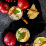 overhead shot of three apple whiskey smash cocktails
