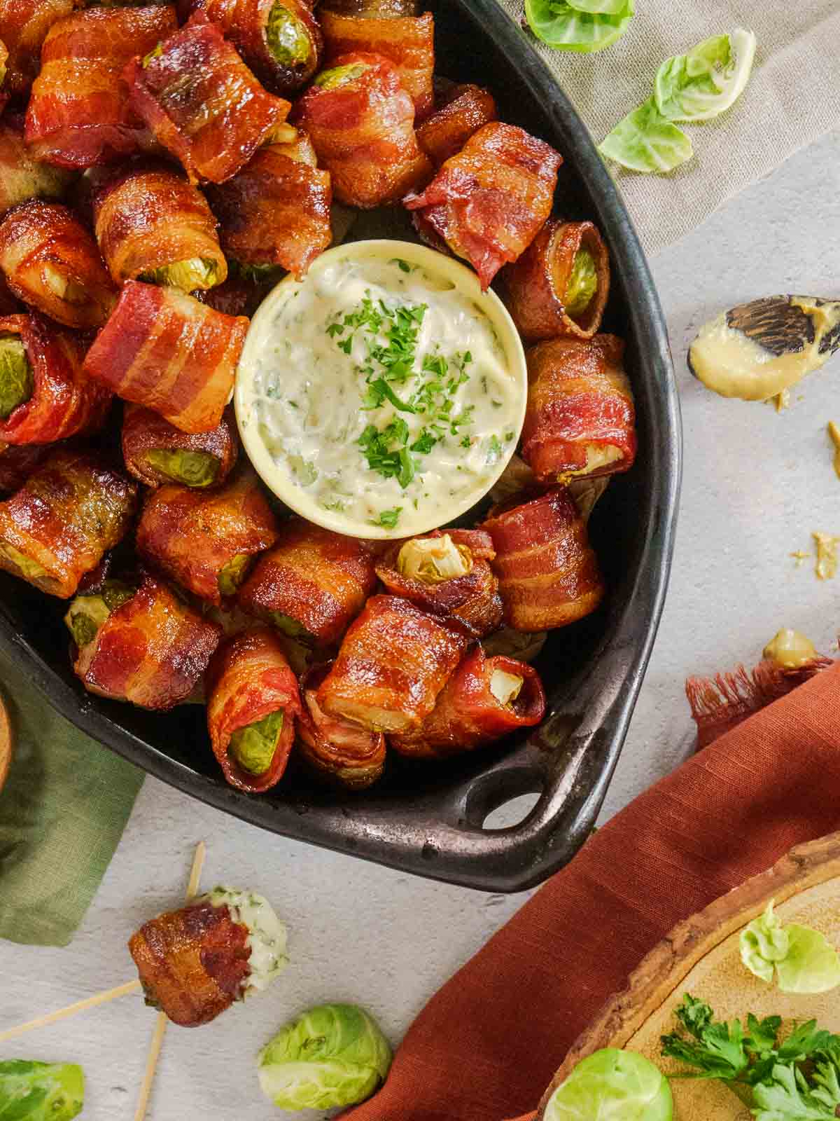 bacon wrapped brussels sprouts in serving dish