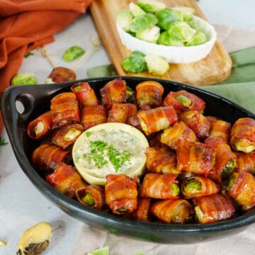 bacon wrapped brussels sprouts appetizer with mustard dip