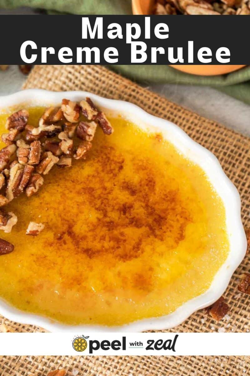 A shallow dish of maple creme brulee topped with chopped pecans sits on a piece of burlap, its caramelized sugar crust glistening invitingly.