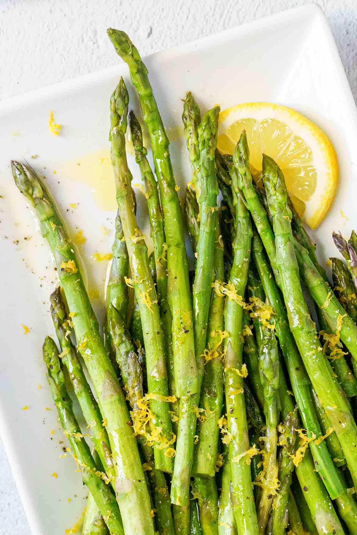 close up of sous vide asparagus with lemon pepper