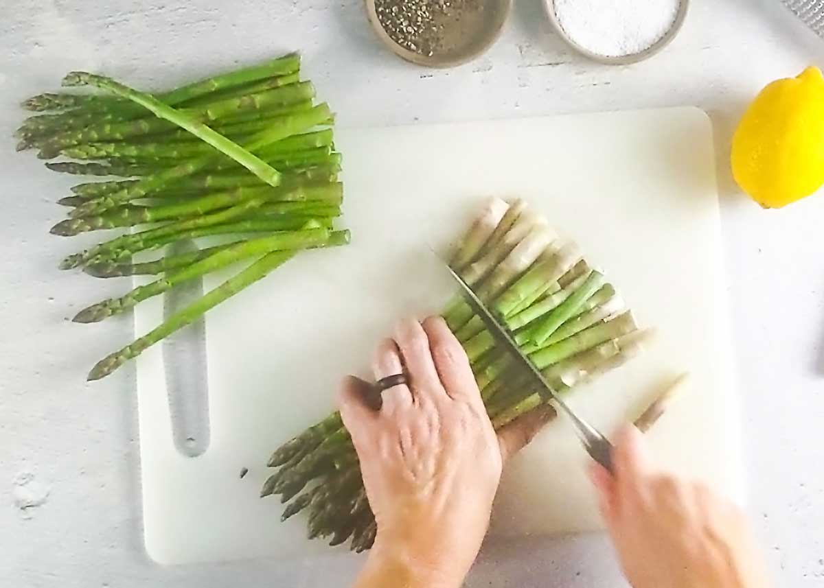 trimming the asparagus ends off.