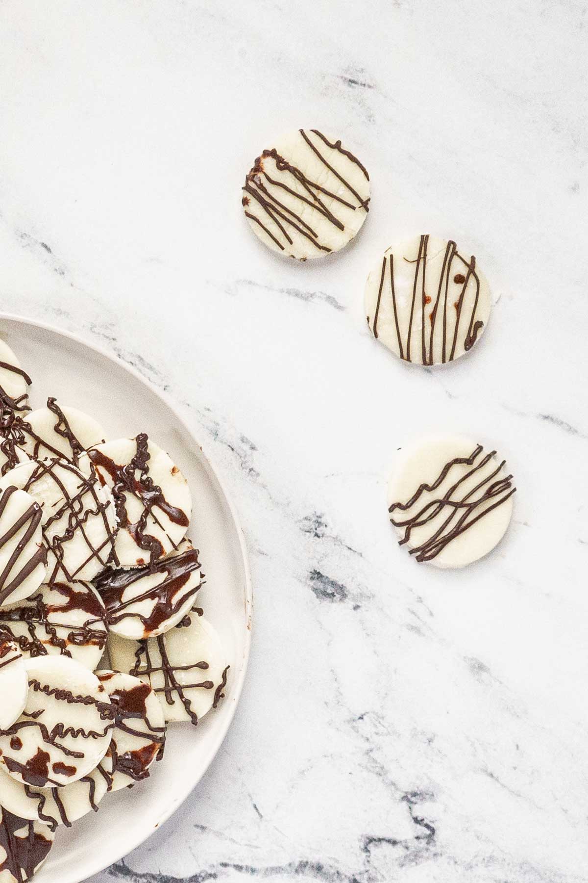 close up shot of peppermint creams with chocolate drizzle