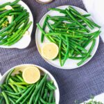 plates of green beans with lemon and garlic