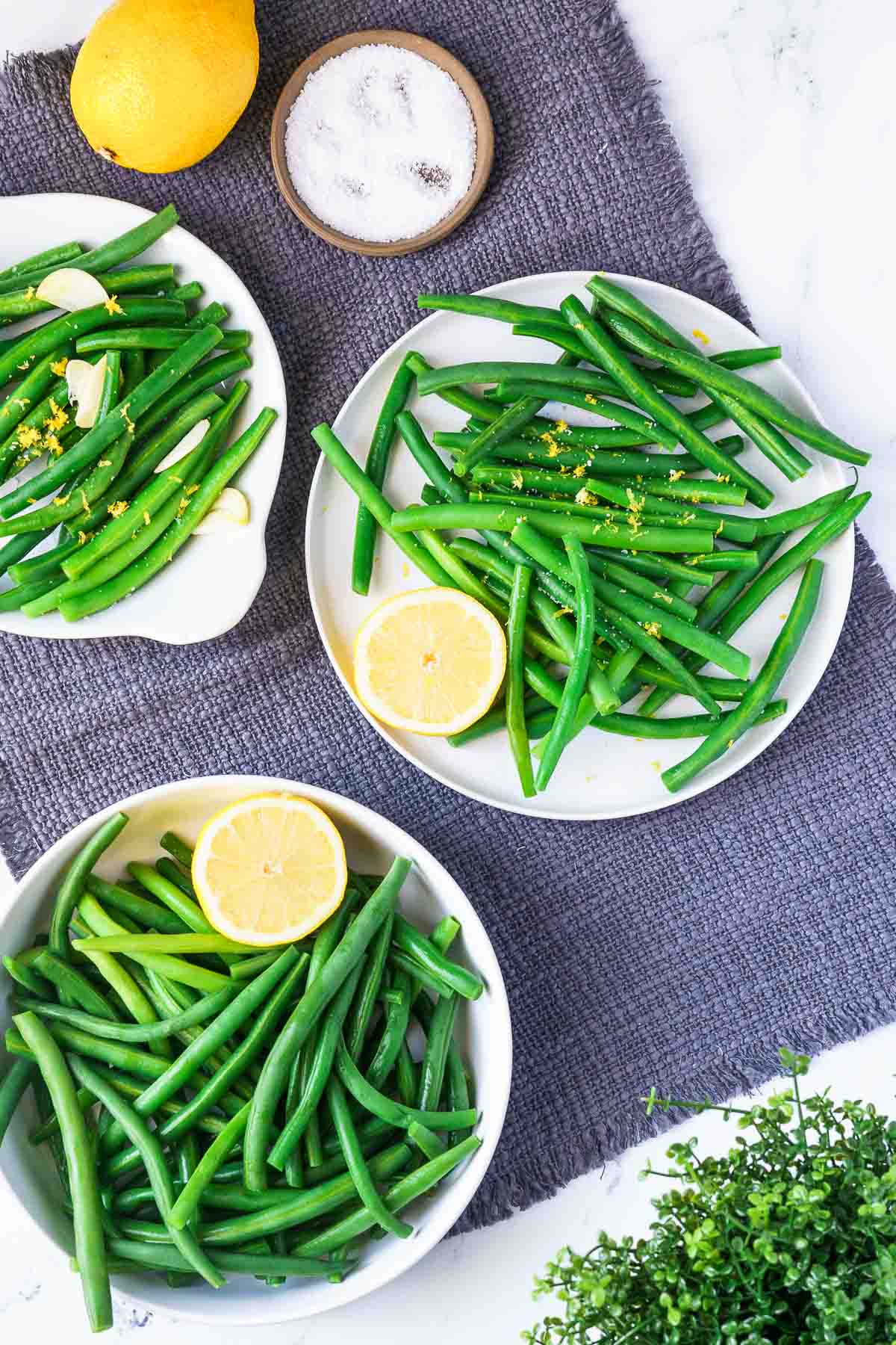 plates of green beans with lemon and garlic
