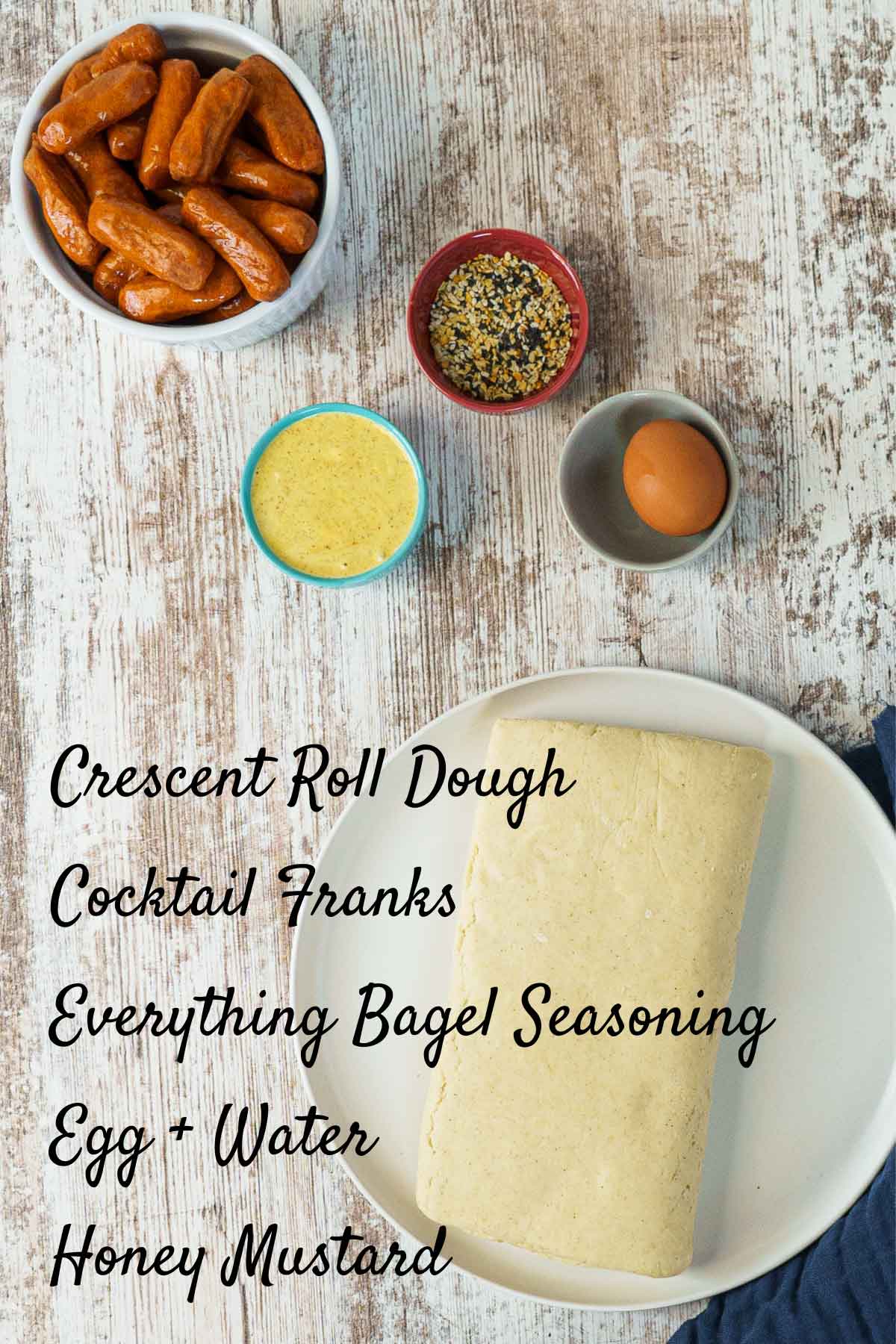 mini crescent dog ingredients on the counter with raw crescent roll dough