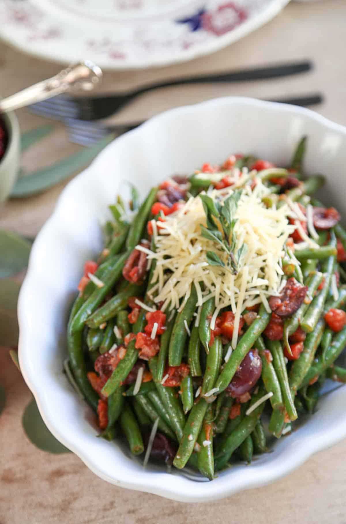 green beans with parm and bacon in a serving dish