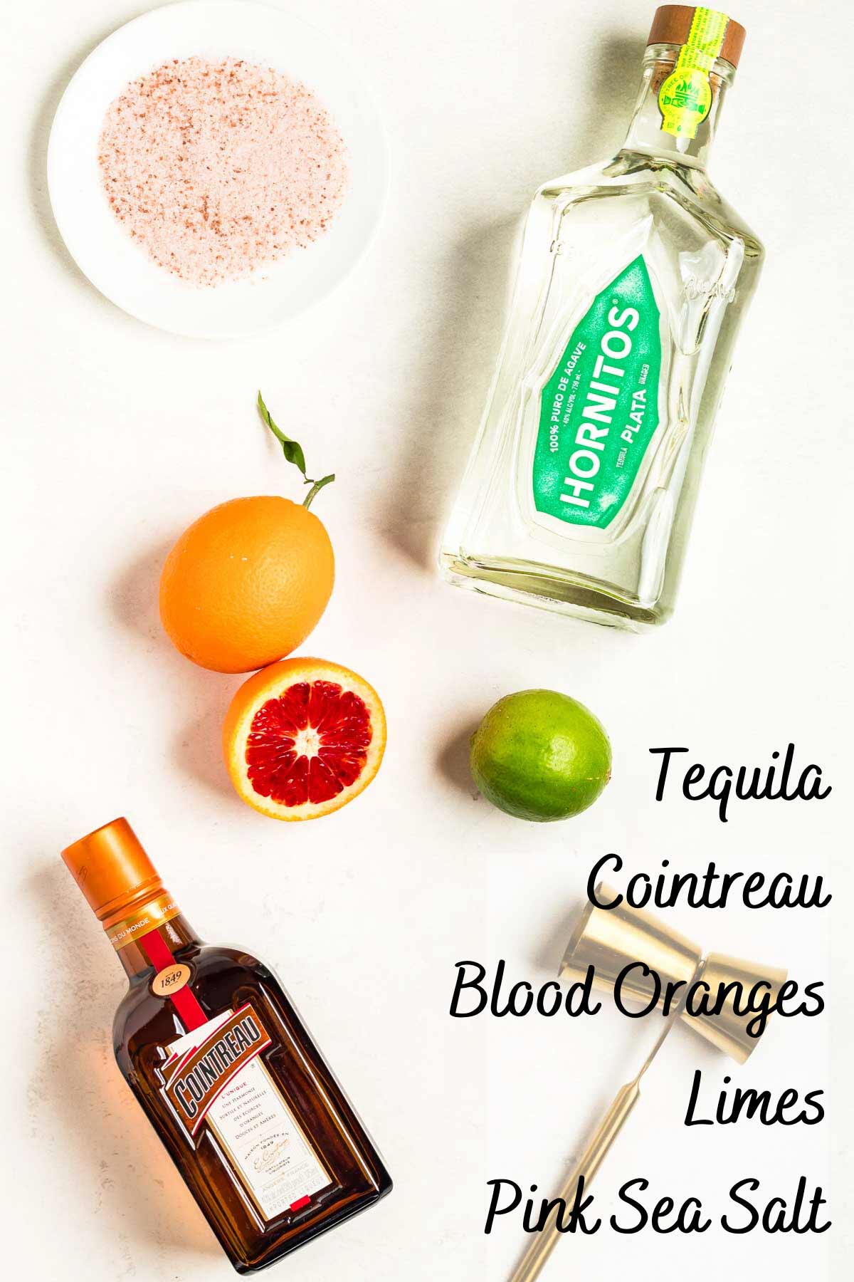 blood orange margaritas recipe ingredients on a counter.