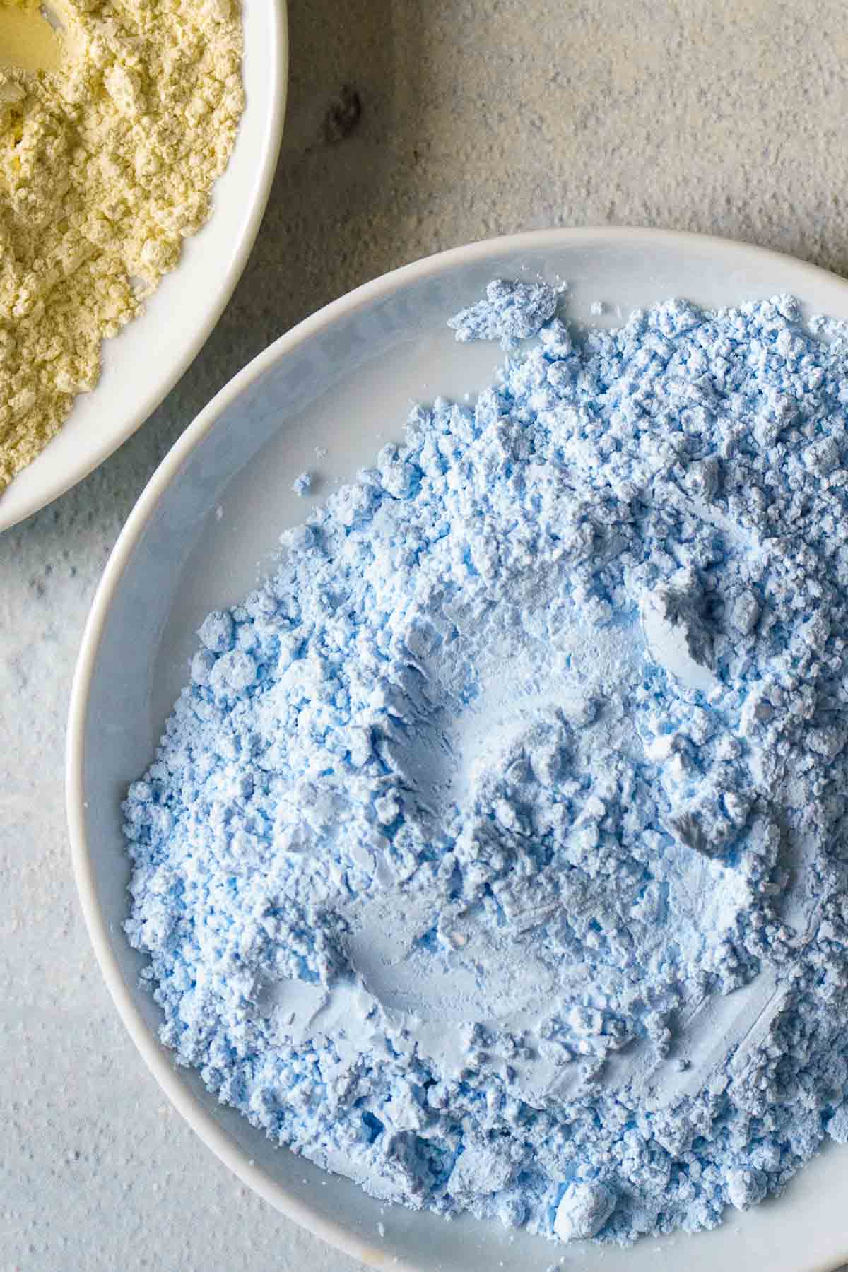 plate with blue powdered sugar.