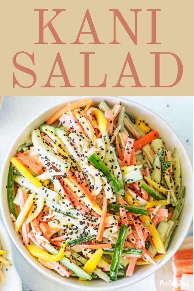 spicy kani salad in white serving bowl.