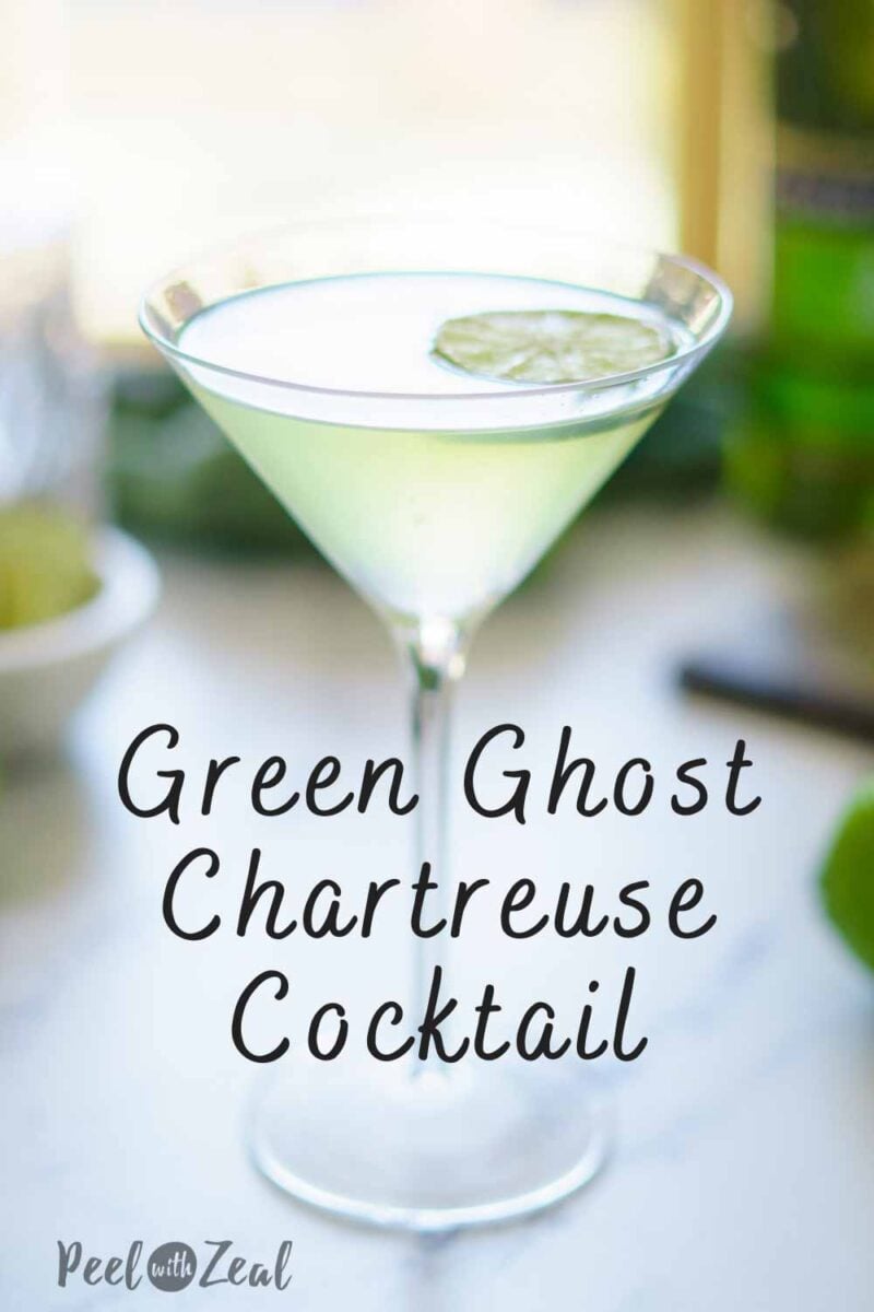 green cocktail in martini glass.