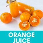 bottles orange juice and fresh oranges on a counter.