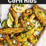corn ribs with chili dipping sauce on platter